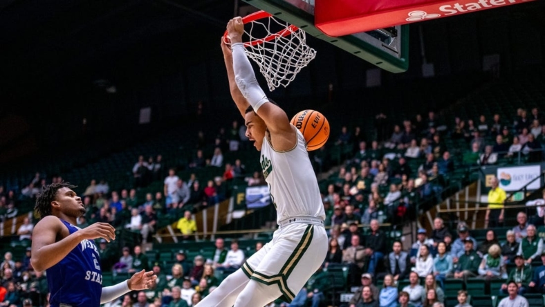 Colorado State senior guard John Tonje (1) finishes a reverse dunk against Weber State at Moby Arena on Monday Nov. 14, 2022.

Csu Bball Vs Weber State