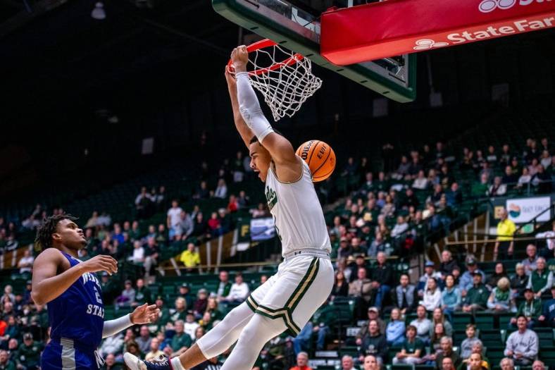 Colorado State senior guard John Tonje (1) finishes a reverse dunk against Weber State at Moby Arena on Monday Nov. 14, 2022.

Csu Bball Vs Weber State