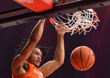 Nov 14, 2022; Champaign, Illinois, USA;  Illinois Fighting Illini guard Ty Rodgers (20) dunks during the first half against the Monmouth Hawks State Farm Center. Mandatory Credit: Ron Johnson-USA TODAY Sports