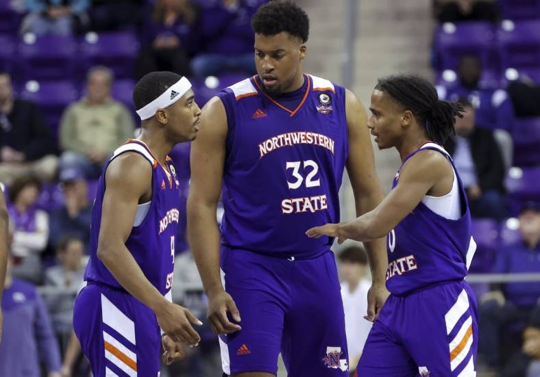 Nov 14, 2022; Fort Worth, Texas, USA;  Northwestern State Demons guard JaMonta' Black (4) and Northwestern State Demons center Jordan Wilmore (32) and Northwestern State Demons guard Demarcus Sharp (0) celebrate during the second half against the TCU Horned Frogs at Ed and Rae Schollmaier Arena. Mandatory Credit: Kevin Jairaj-USA TODAY Sports