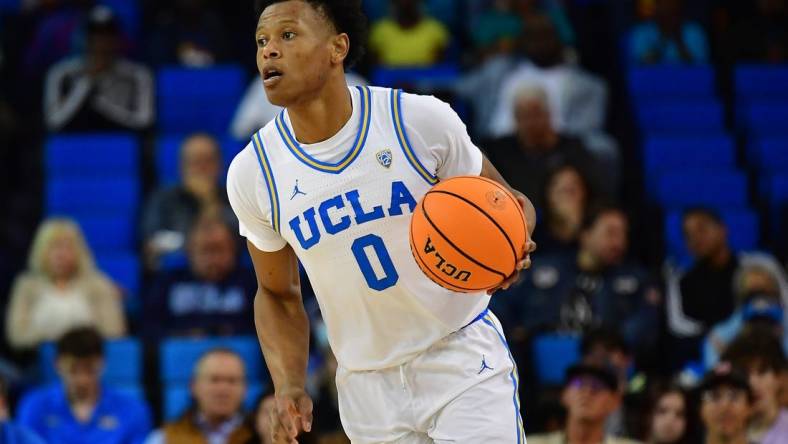 Nov 14, 2022; Los Angeles, California, USA; UCLA Bruins guard Jaylen Clark (0) moves the ball up court against the Norfolk State Spartans during the first half at Pauley Pavilion. Mandatory Credit: Gary A. Vasquez-USA TODAY Sports