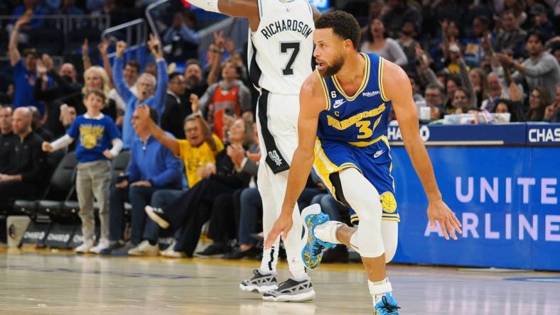 Nov 14, 2022; San Francisco, California, USA; Golden State Warriors point guard Stephen Curry (30) celebrates after scoring a three point basket against the San Antonio Spurs during the second quarter at Chase Center. Mandatory Credit: Kelley L Cox-USA TODAY Sports