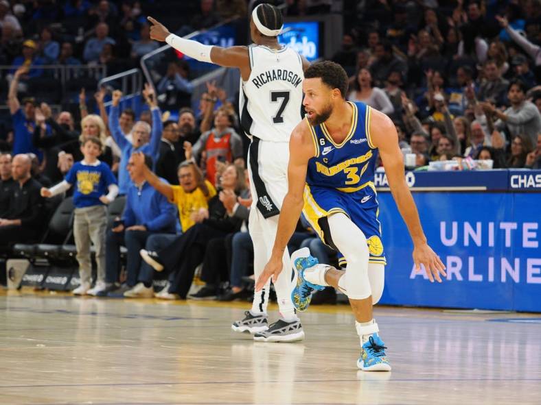 Nov 14, 2022; San Francisco, California, USA; Golden State Warriors point guard Stephen Curry (30) celebrates after scoring a three point basket against the San Antonio Spurs during the second quarter at Chase Center. Mandatory Credit: Kelley L Cox-USA TODAY Sports