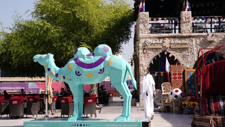 Nov 15, 2022; Doha, QATAR; One of many World Cup statues in Souk Waqif ahead of the 2022 FIFA World Cup. Mandatory Credit: Danielle Parhizkaran-USA TODAY Sports