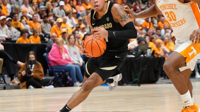 Nov 13, 2022; Nashville, Tennessee, USA;  Colorado Buffaloes guard Julian Hammond III (1) dribbles against the Tennessee Volunteers during the second hall at Bridgestone Arena. Mandatory Credit: Steve Roberts-USA TODAY Sports