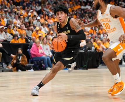 Nov 13, 2022; Nashville, Tennessee, USA;  Colorado Buffaloes guard Julian Hammond III (1) dribbles against the Tennessee Volunteers during the second hall at Bridgestone Arena. Mandatory Credit: Steve Roberts-USA TODAY Sports