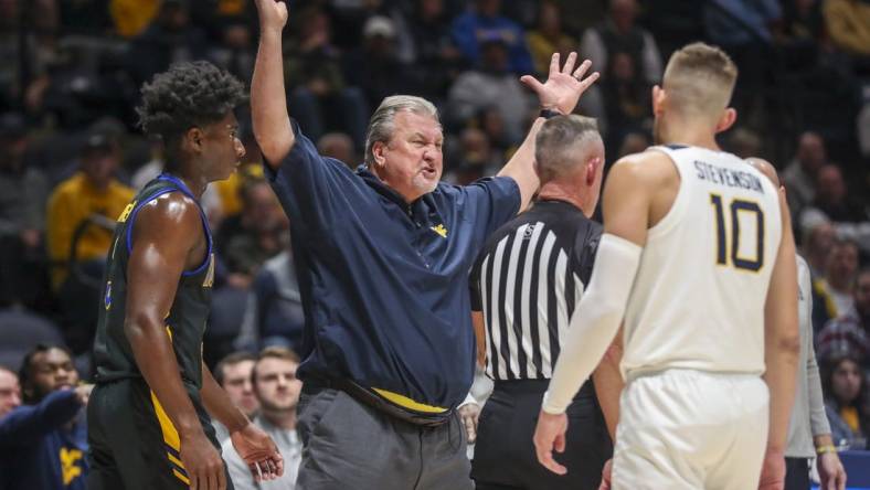 Nov 15, 2022; Morgantown, West Virginia, USA; West Virginia Mountaineers head coach Bob Huggins reacts after being assessed a technical foul during the first half against the Morehead State Eagles at WVU Coliseum. Mandatory Credit: Ben Queen-USA TODAY Sports