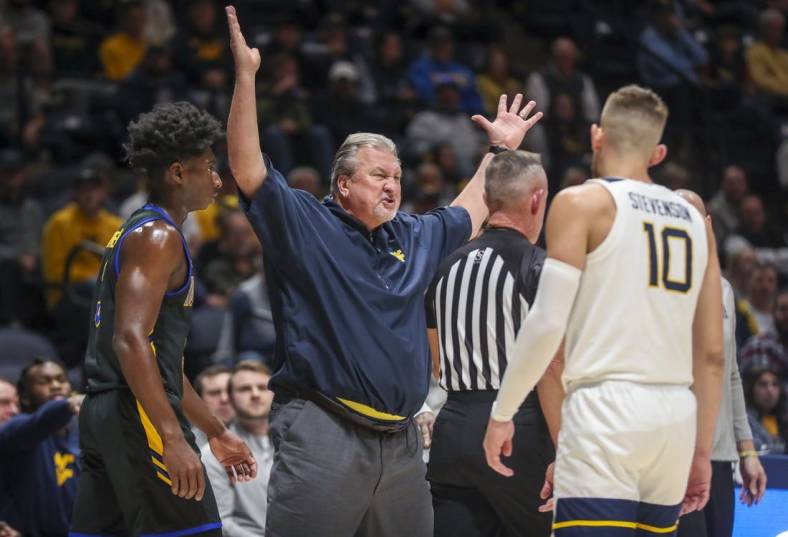 Nov 15, 2022; Morgantown, West Virginia, USA; West Virginia Mountaineers head coach Bob Huggins reacts after being assessed a technical foul during the first half against the Morehead State Eagles at WVU Coliseum. Mandatory Credit: Ben Queen-USA TODAY Sports