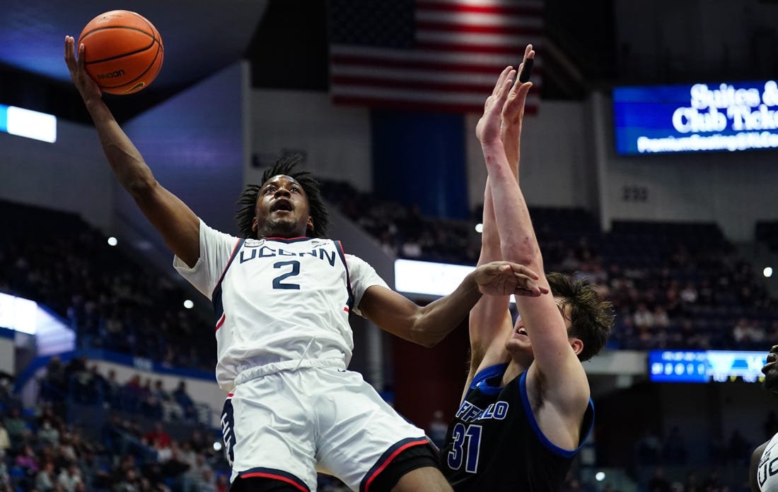 Nov 15, 2022; Hartford, Connecticut, USA; Connecticut Huskies guard Tristen Newton (2). Shoots against Buffalo Bulls center Isaac Jack (31) in the first half at XL Center. Mandatory Credit: David Butler II-USA TODAY Sports