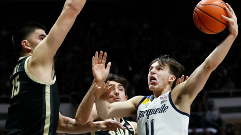 Marquette Golden Eagles guard Tyler Kolek (11) goes up for a shot during the NCAA men   s basketball game against the Purdue Boilermakers, Tuesday, Nov. 15, 2022, at Mackey Arena in West Lafayette, Ind.

Purduemarquettembb111522 Am34400