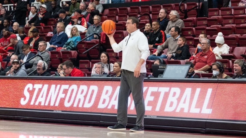 Nov 15, 2022; Stanford, California, USA; Stanford Cardinal head coach Jerod Haase holds the basketball during the first half against the San Diego State Aztecs at Maples Pavilion. Mandatory Credit: Stan Szeto-USA TODAY Sports