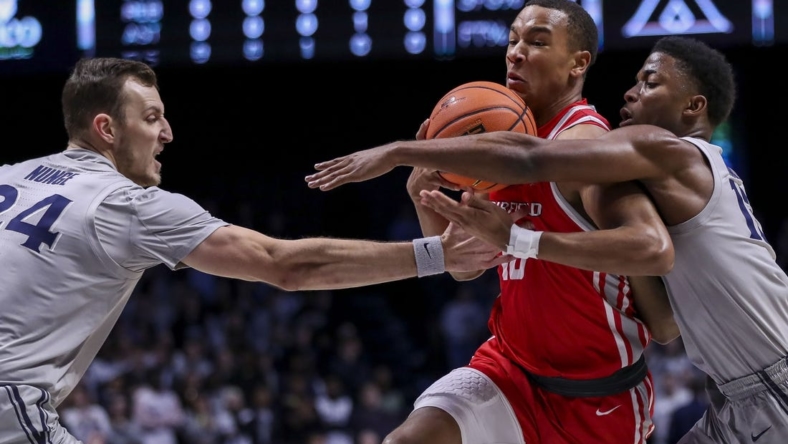 Nov 15, 2022; Cincinnati, Ohio, USA; Xavier Musketeers forward Jack Nunge (24) and guard KyKy Tandy (15) battle for the ball against Fairfield Stags forward Allan Jeanne-Rose (10) in the first half at Cintas Center. Mandatory Credit: Katie Stratman-USA TODAY Sports