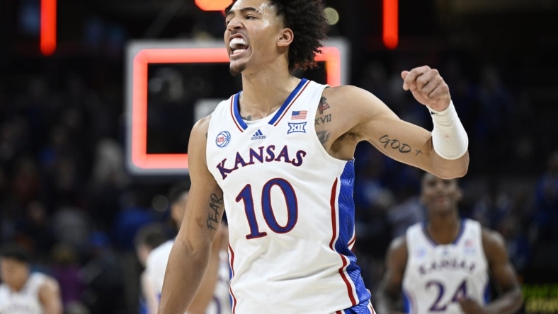 Nov 15, 2022; Indianapolis, Indiana, USA;  Kansas Jayhawks forward Jalen Wilson (10) reacts to defeating the Duke Blue Devils after the game at Gainbridge Fieldhouse. Jayhawks defeat the Blue Devils 69 to 64. Mandatory Credit: Marc Lebryk-USA TODAY Sports