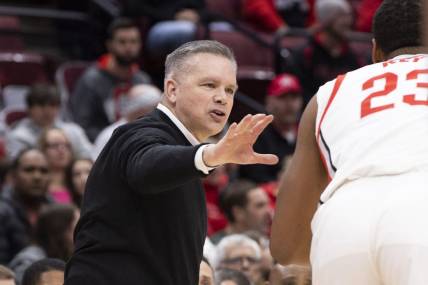 Nov 16, 2022; Columbus, Ohio, USA; Ohio State Buckeyes head coach Chris Holtmann gives direction t0o Ohio State Buckeyes forward Zed Key (23) in the first half of the game against the Eastern Illinois Panthers at Value City Arena. Mandatory Credit: Greg Bartram-USA TODAY Sports
