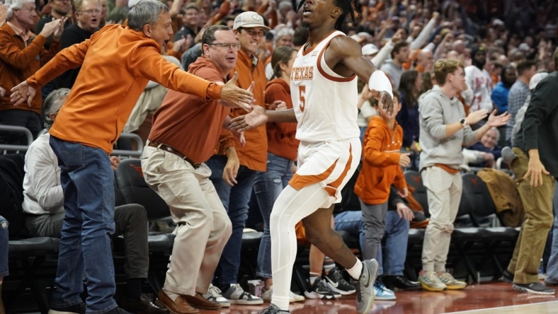 Nov 16, 2022; Austin, Texas, USA; Texas Longhorns guard Marcus Carr (5) interacts with fans after scoring a three point basket in the second half against the Gonzaga Bulldogs at Moody Center. Mandatory Credit: Scott Wachter-USA TODAY Sports