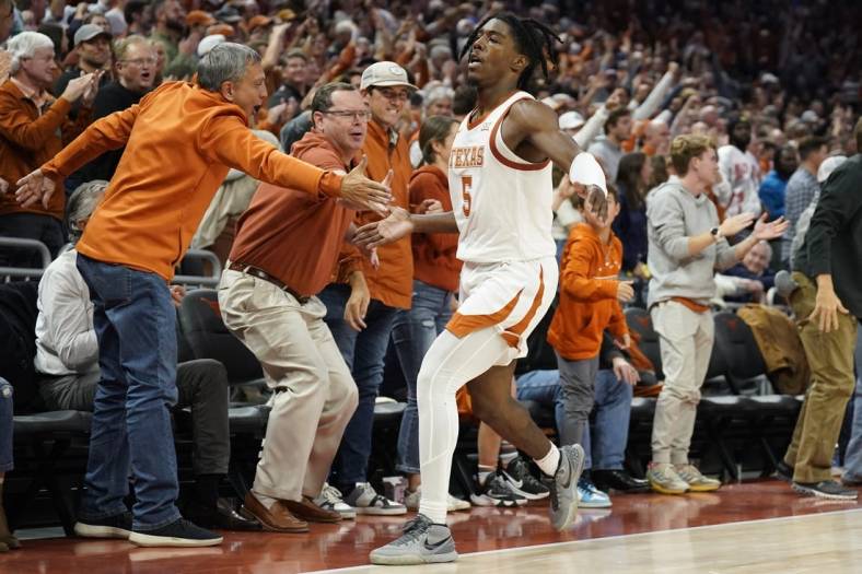 Nov 16, 2022; Austin, Texas, USA; Texas Longhorns guard Marcus Carr (5) interacts with fans after scoring a three point basket in the second half against the Gonzaga Bulldogs at Moody Center. Mandatory Credit: Scott Wachter-USA TODAY Sports