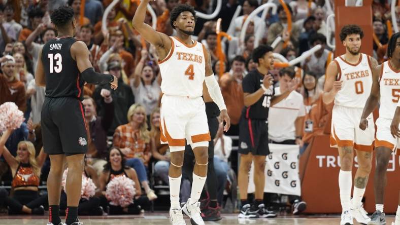 Nov 16, 2022; Austin, Texas, USA; Texas Longhorns guard Tyrese Hunter (4) reacts after scoring a three-pointer during the second half against the Gonzaga Bulldogs at Moody Center. Mandatory Credit: Scott Wachter-USA TODAY Sports