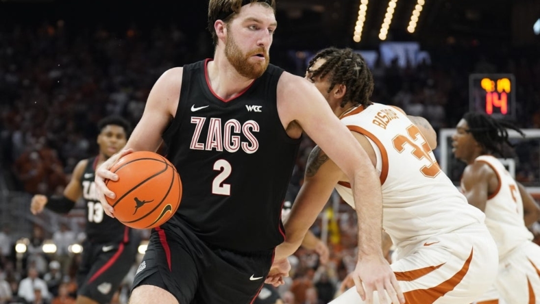 Nov 16, 2022; Austin, Texas, USA; Gonzaga Bulldogs forward Drew Timme (2) drives to the basket against Texas Longhorns forward Christian Bishop (32) during the second half at Moody Center. Mandatory Credit: Scott Wachter-USA TODAY Sports
