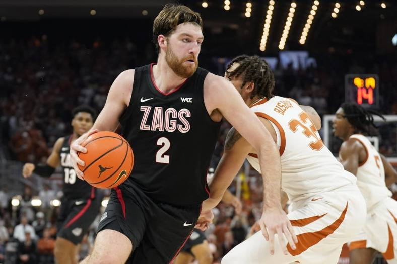 Nov 16, 2022; Austin, Texas, USA; Gonzaga Bulldogs forward Drew Timme (2) drives to the basket against Texas Longhorns forward Christian Bishop (32) during the second half at Moody Center. Mandatory Credit: Scott Wachter-USA TODAY Sports