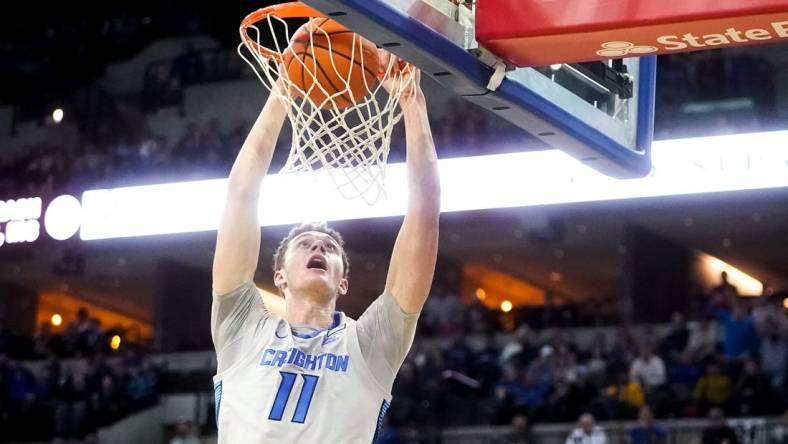 Nov 17, 2022; Omaha, Nebraska, USA; Creighton Bluejays center Ryan Kalkbrenner (11) dunks the ball during the first half against the UC Riverside Highlanders at CHI Health Center Omaha. Mandatory Credit: Dylan Widger-USA TODAY Sports