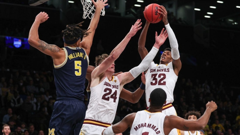 Nov 17, 2022; Brooklyn, New York, USA; Arizona State Sun Devils forward Alonzo Gaffney (32) rebounds in front of forward Duke Brennan (24) and Michigan Wolverines forward Terrance Williams II (5) during the first half at Barclays Center. Mandatory Credit: Vincent Carchietta-USA TODAY Sports