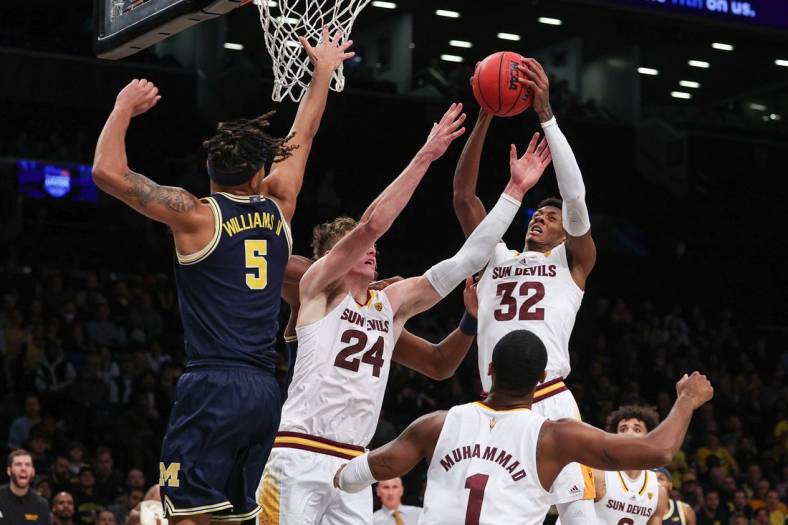 Nov 17, 2022; Brooklyn, New York, USA; Arizona State Sun Devils forward Alonzo Gaffney (32) rebounds in front of forward Duke Brennan (24) and Michigan Wolverines forward Terrance Williams II (5) during the first half at Barclays Center. Mandatory Credit: Vincent Carchietta-USA TODAY Sports