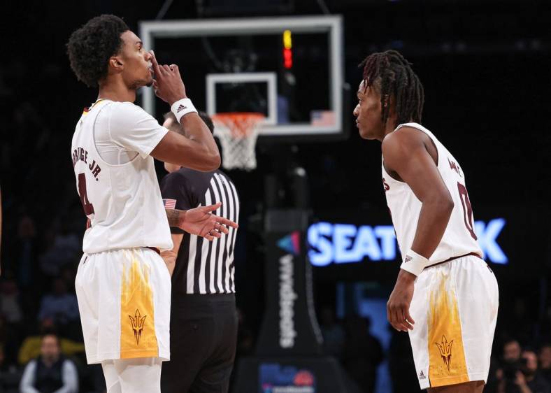 Nov 17, 2022; Brooklyn, New York, USA; Arizona State Sun Devils guard Desmond Cambridge Jr. (4) gestures to the crowd in front of Arizona State Sun Devils guard DJ Horne (0) during the second half against the Michigan Wolverines at Barclays Center. Mandatory Credit: Vincent Carchietta-USA TODAY Sports