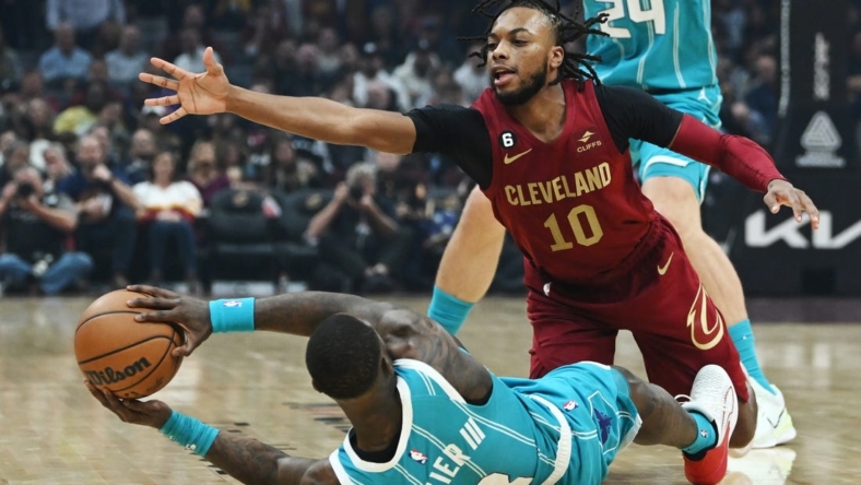 Nov 18, 2022; Cleveland, Ohio, USA; Cleveland Cavaliers guard Darius Garland (10) goes for the ball as Charlotte Hornets guard Terry Rozier (3) tries to pass from the floor during the first quarter at Rocket Mortgage FieldHouse. Mandatory Credit: Ken Blaze-USA TODAY Sports