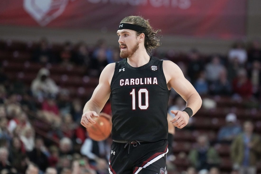 Nov 18, 2022; Charleston, South Carolina, USA; South Carolina Gamecocks forward Hayden Brown (10) runs up court in the second half against the Davidson Wildcats at TD Arena. Mandatory Credit: David Yeazell-USA TODAY Sports