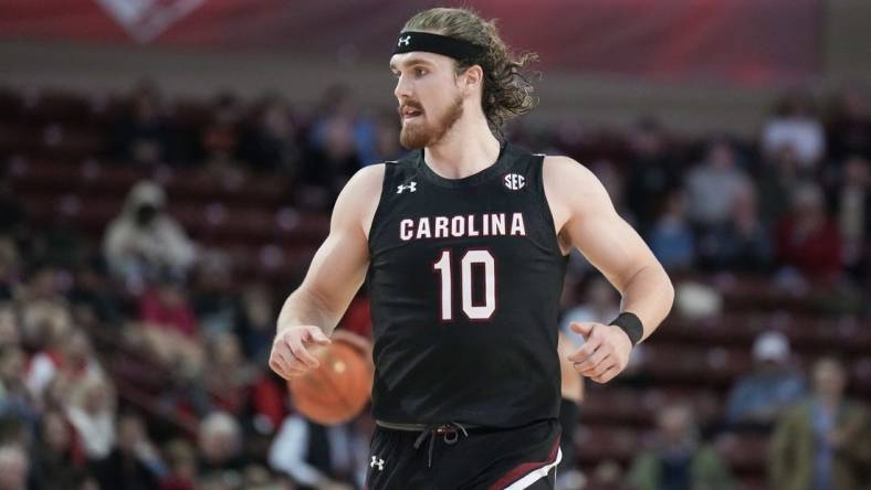 Nov 18, 2022; Charleston, South Carolina, USA; South Carolina Gamecocks forward Hayden Brown (10) runs up court in the second half against the Davidson Wildcats at TD Arena. Mandatory Credit: David Yeazell-USA TODAY Sports