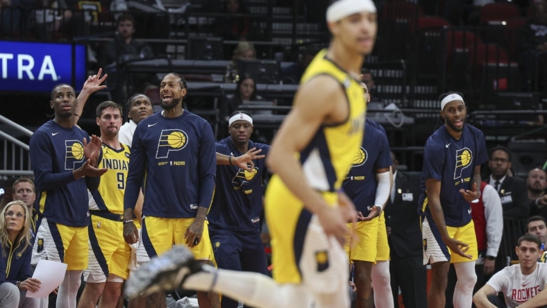 Nov 18, 2022; Houston, Texas, USA; Indiana Pacers players react after guard Andrew Nembhard (2) scores during the fourth quarter against the Houston Rockets at Toyota Center. Mandatory Credit: Troy Taormina-USA TODAY Sports