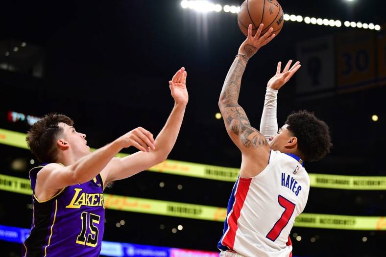 Nov 18, 2022; Los Angeles, California, USA; Detroit Pistons guard Killian Hayes (7) shoots against Los Angeles Lakers guard Austin Reaves (15) during the first half at Crypto.com Arena. Mandatory Credit: Gary A. Vasquez-USA TODAY Sports
