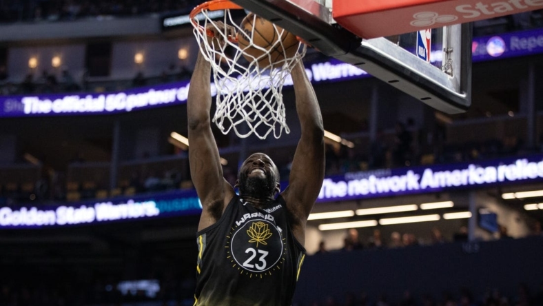 Nov 18, 2022; San Francisco, California, USA; Golden State Warriors forward Draymond Green (23) dunks against the New York Knicks during the third quarter at Chase Center. Mandatory Credit: D. Ross Cameron-USA TODAY Sports