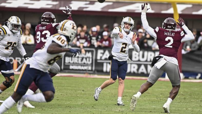 Nov 19, 2022; Starkville, Mississippi, USA; East Tennessee State Buccaneers quarterback Tyler Riddell (2) makes a pass against the Mississippi State Bulldogs during the first quarter at Davis Wade Stadium at Scott Field. Mandatory Credit: Matt Bush-USA TODAY Sports