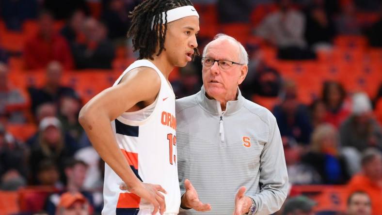 Nov 15, 2022; Syracuse, New York, USA; Syracuse Orange head coach Jim Boeheim talks with forward Benny Williams (13) against the Colgate Raiders during the second half at the JMA Wireless Dome. Mandatory Credit: Rich Barnes-USA TODAY Sports