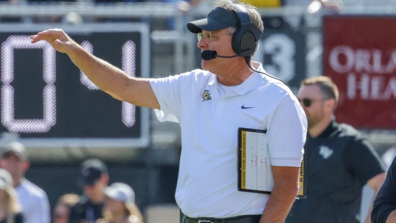 Nov 19, 2022; Orlando, Florida, USA; UCF Knights head coach Gus Malzahn looks on during the second half against the Navy Midshipmen at FBC Mortgage Stadium. Mandatory Credit: Mike Watters-USA TODAY Sports