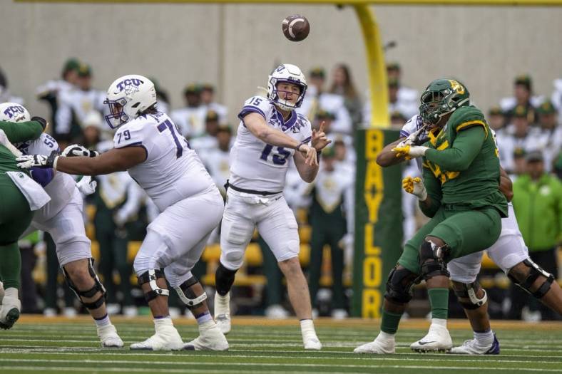 Nov 19, 2022; Waco, Texas, USA; TCU Horned Frogs quarterback Max Duggan (15) passes against the Baylor Bears during the second half at McLane Stadium. Mandatory Credit: Jerome Miron-USA TODAY Sports