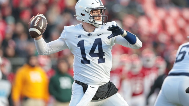 Nov 19, 2022; Piscataway, New Jersey, USA; Penn State Nittany Lions quarterback Sean Clifford (14) throws the ball during the first half against the Rutgers Scarlet Knights at SHI Stadium. Mandatory Credit: Vincent Carchietta-USA TODAY Sports