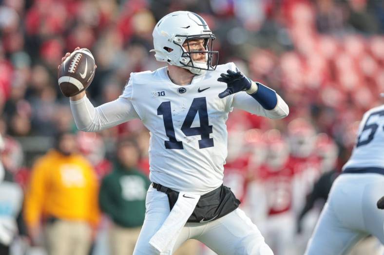 Nov 19, 2022; Piscataway, New Jersey, USA; Penn State Nittany Lions quarterback Sean Clifford (14) throws the ball during the first half against the Rutgers Scarlet Knights at SHI Stadium. Mandatory Credit: Vincent Carchietta-USA TODAY Sports