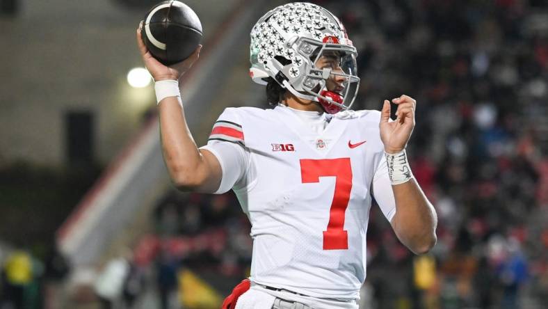 Nov 19, 2022; College Park, Maryland, USA; Ohio State Buckeyes quarterback C.J. Stroud (7) throws during the second half against the Maryland Terrapins  at SECU Stadium. Mandatory Credit: Tommy Gilligan-USA TODAY Sports