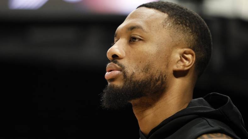 Nov 19, 2022; Portland, Oregon, USA; Portland Trail Blazers point guard Damian Lillard (0) warms up prior to a game against the Utah Jazz at Moda Center. Mandatory Credit: Soobum Im-USA TODAY Sports