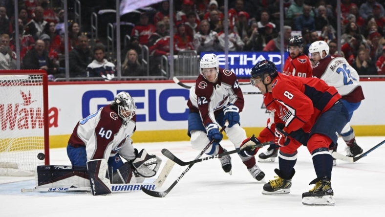 Nov 19, 2022; Washington, District of Columbia, USA; Colorado Avalanche goaltender Alexandar Georgiev (40) makes a save on the shot by Washington Capitals left wing Alex Ovechkin (8) during the first period at Capital One Arena. Mandatory Credit: Brad Mills-USA TODAY Sports