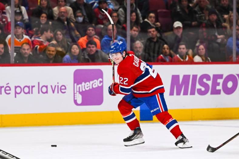 Nov 19, 2022; Montreal, Quebec, CAN; Montreal Canadiens right wing Cole Caufield (22) gets ready to shoot the puck during the second period at Bell Centre. Mandatory Credit: David Kirouac-USA TODAY Sports
