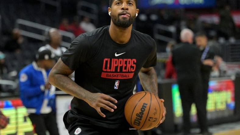 Nov 19, 2022; Los Angeles, California, USA; Los Angeles Clippers guard Paul George (13) warms up prior to the game against the San Antonio Spurs at Crypto.com Arena. Mandatory Credit: Jayne Kamin-Oncea-USA TODAY Sports