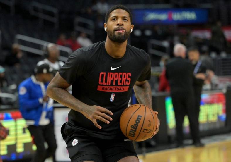 Nov 19, 2022; Los Angeles, California, USA; Los Angeles Clippers guard Paul George (13) warms up prior to the game against the San Antonio Spurs at Crypto.com Arena. Mandatory Credit: Jayne Kamin-Oncea-USA TODAY Sports
