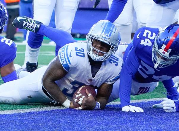 Jamaal Williams scores trio of TDs as Lions surprise Giants