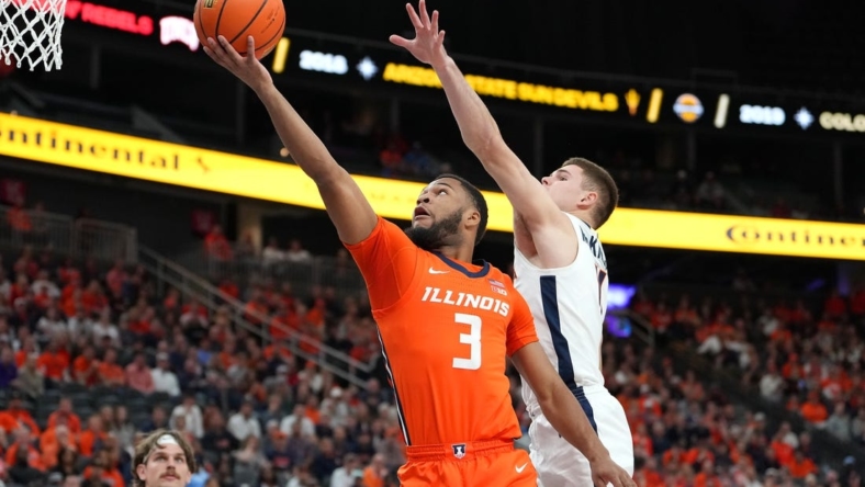 Nov 20, 2022; Las Vegas, Nevada, USA; Illinois Fighting Illini guard Jayden Epps (3) shoots inside the defense of Virginia Cavaliers guard Isaac McKneely (11) during the first half at T-Mobile Arena. Mandatory Credit: Stephen R. Sylvanie-USA TODAY Sports