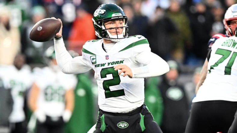 Nov 20, 2022; Foxborough, Massachusetts, USA; New York Jets quarterback Zach Wilson (2) passes the ball against the New England Patriots during the second half at Gillette Stadium. Mandatory Credit: Brian Fluharty-USA TODAY Sports