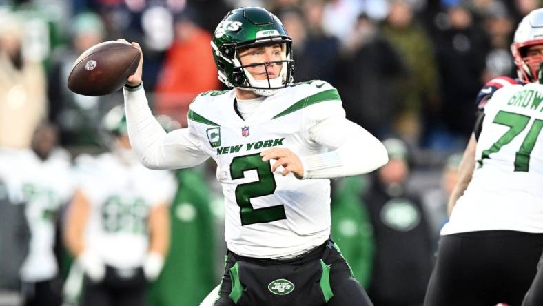 Nov 20, 2022; Foxborough, Massachusetts, USA; New York Jets quarterback Zach Wilson (2) passes the ball against the New England Patriots during the second half at Gillette Stadium. Mandatory Credit: Brian Fluharty-USA TODAY Sports