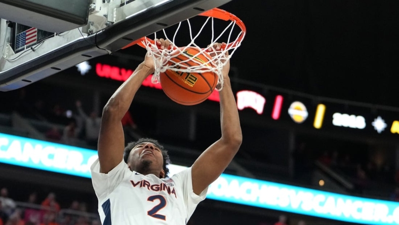 Nov 20, 2022; Las Vegas, Nevada, USA; Virginia Cavaliers guard Reece Beekman (2) dunks against the Illinois Fighting Illini during the second half at T-Mobile Arena. Mandatory Credit: Stephen R. Sylvanie-USA TODAY Sports